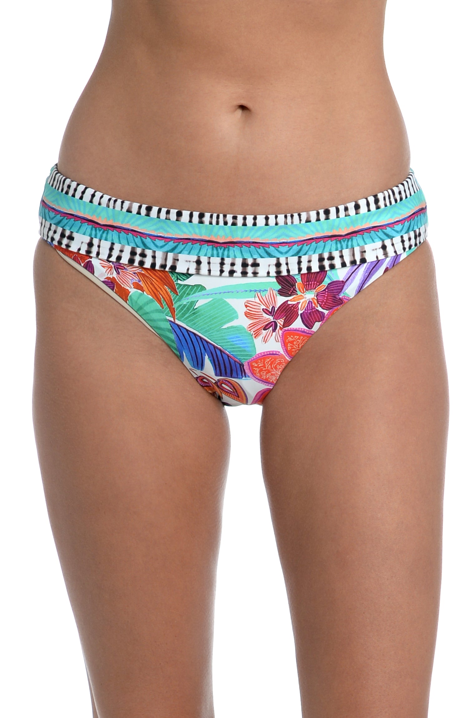 Model is wearing a vibrant multi-colored tropical printed shirred hipster bottom from our Tropics of Tropez collection!