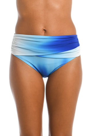 Model is wearing a sapphire colored ombre printed mid waist bottom from our Ocean Oasis collection!