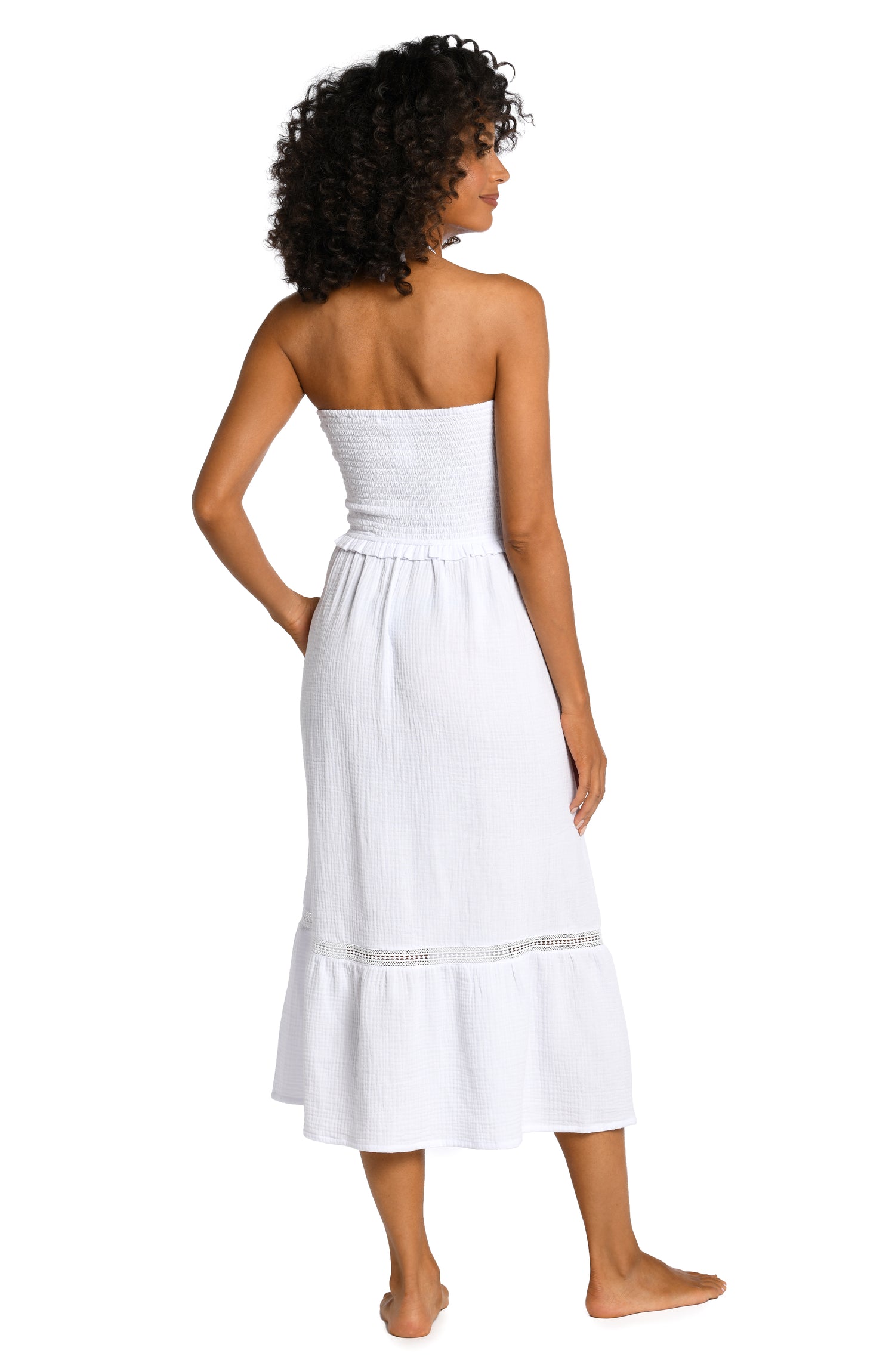 Model is wearing a white midi dress cover up from our Seaside Covers collection!
