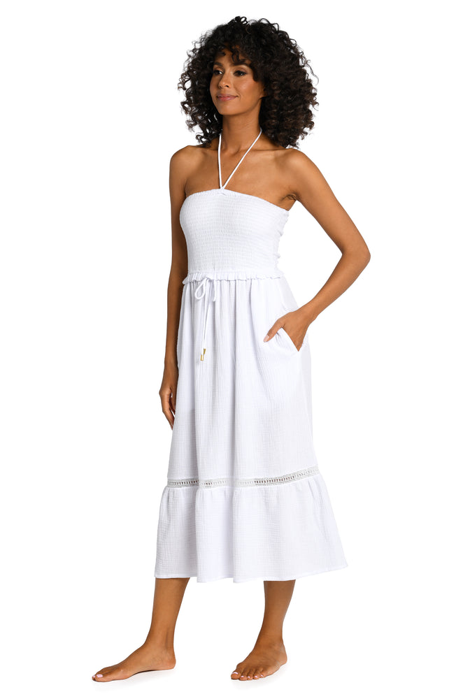 
            
                Load image into Gallery viewer, Model is wearing a white midi dress cover up from our Seaside Covers collection!
            
        
