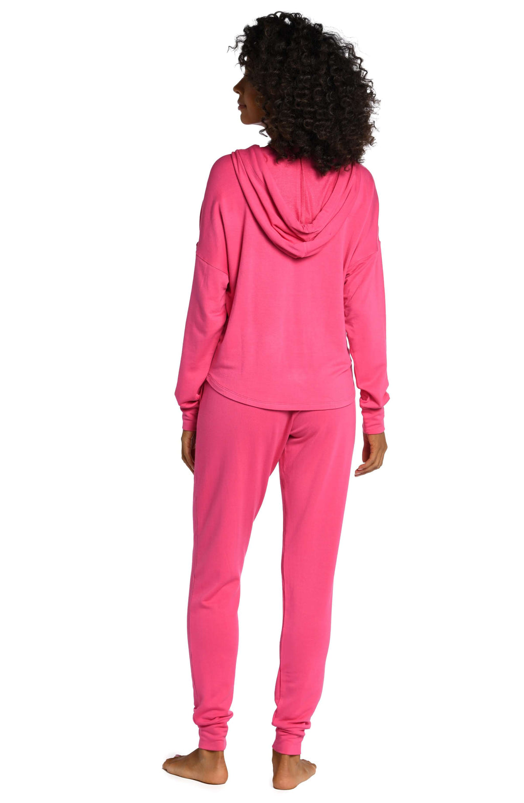 Model is wearing a pop pink colored knitted joggers from our Living in Leisure collection!
