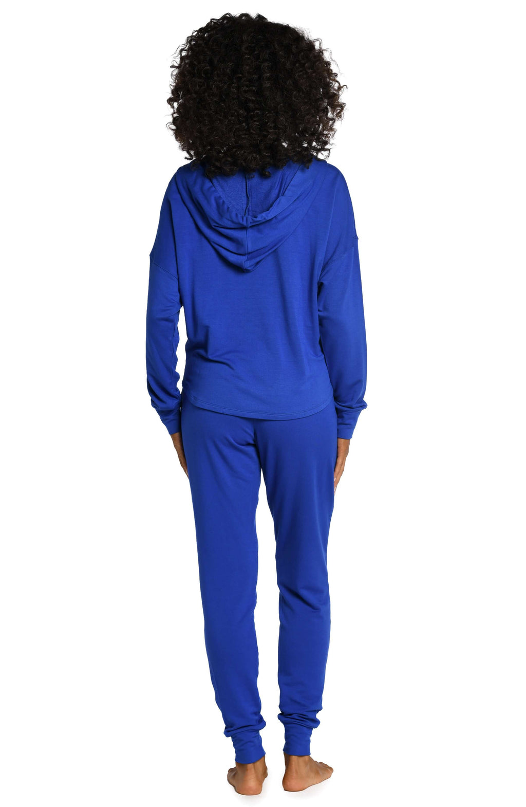 Model is wearing a sapphire colored knitted joggers from our Living in Leisure collection!
