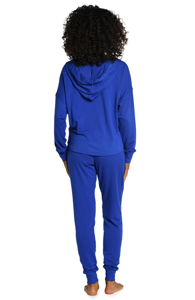 
            
                Load image into Gallery viewer, Model is wearing a sapphire colored knitted joggers from our Living in Leisure collection!
            
        