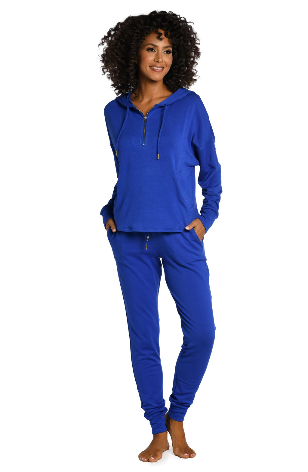 Model is wearing a sapphire colored knitted joggers from our Living in Leisure collection!