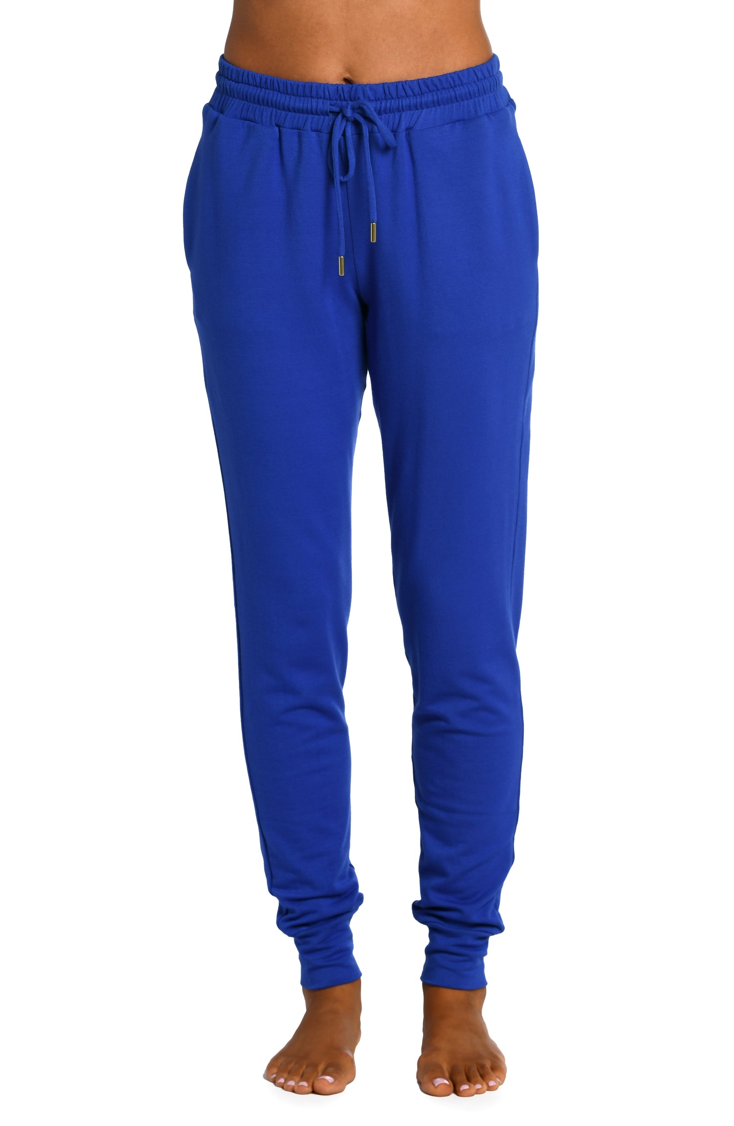Model is wearing a sapphire colored knitted joggers from our Living in Leisure collection!