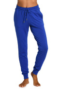 Model is wearing a sapphire colored knitted joggers from our Living in Leisure collection!