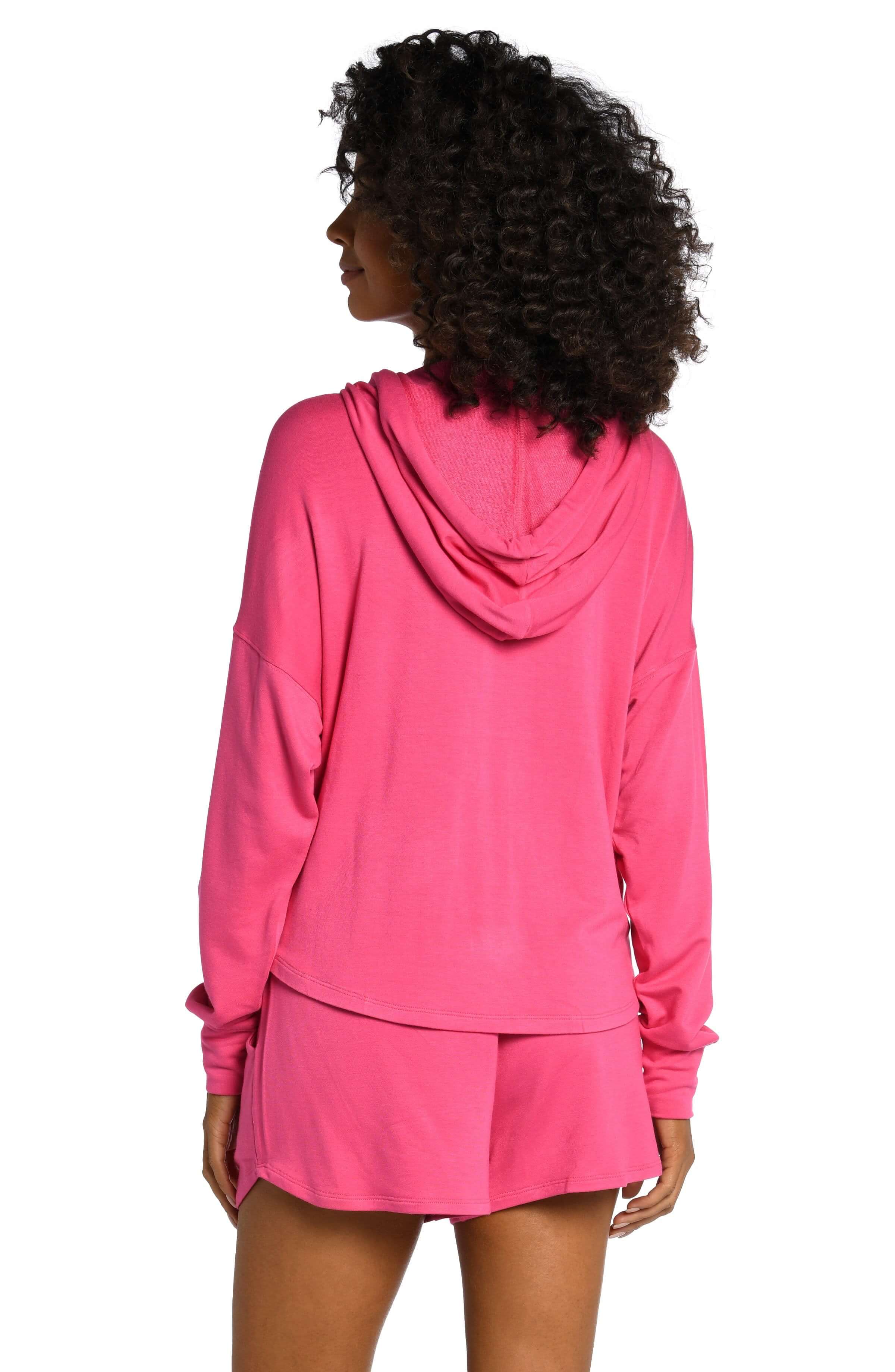Model is wearing a pop pink colored knitted joggers from our Living in Leisure collection!