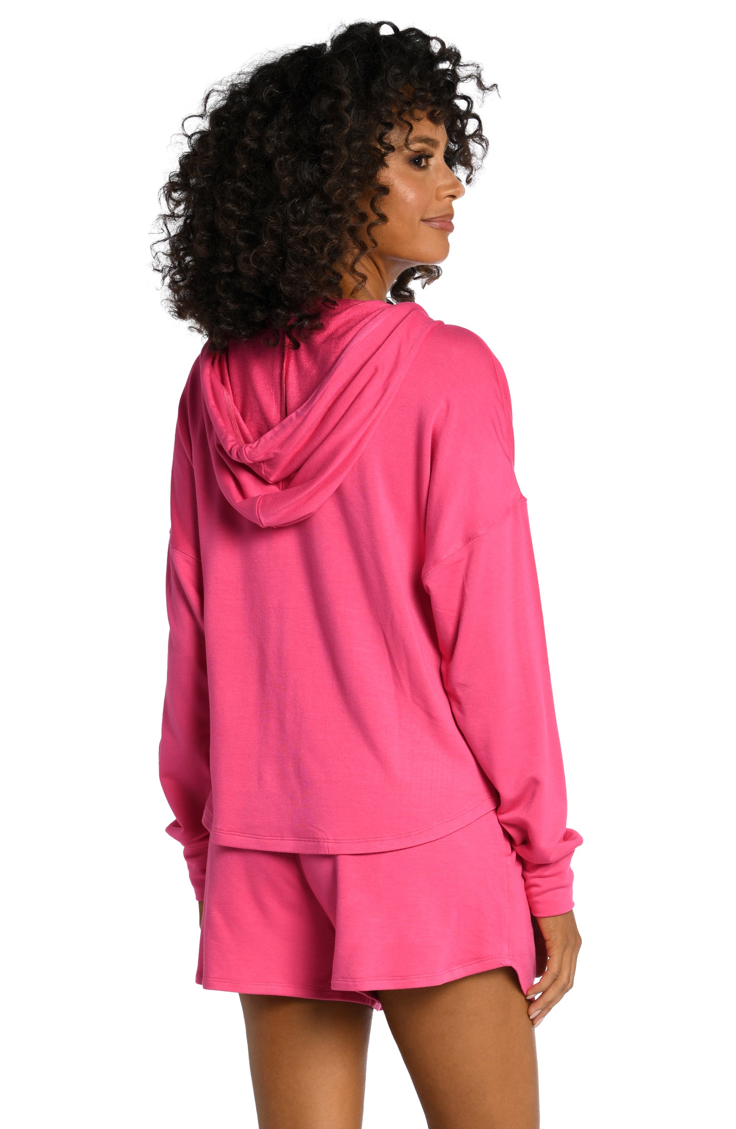 Model is wearing a pop pink colored knitted joggers from our Living in Leisure collection!