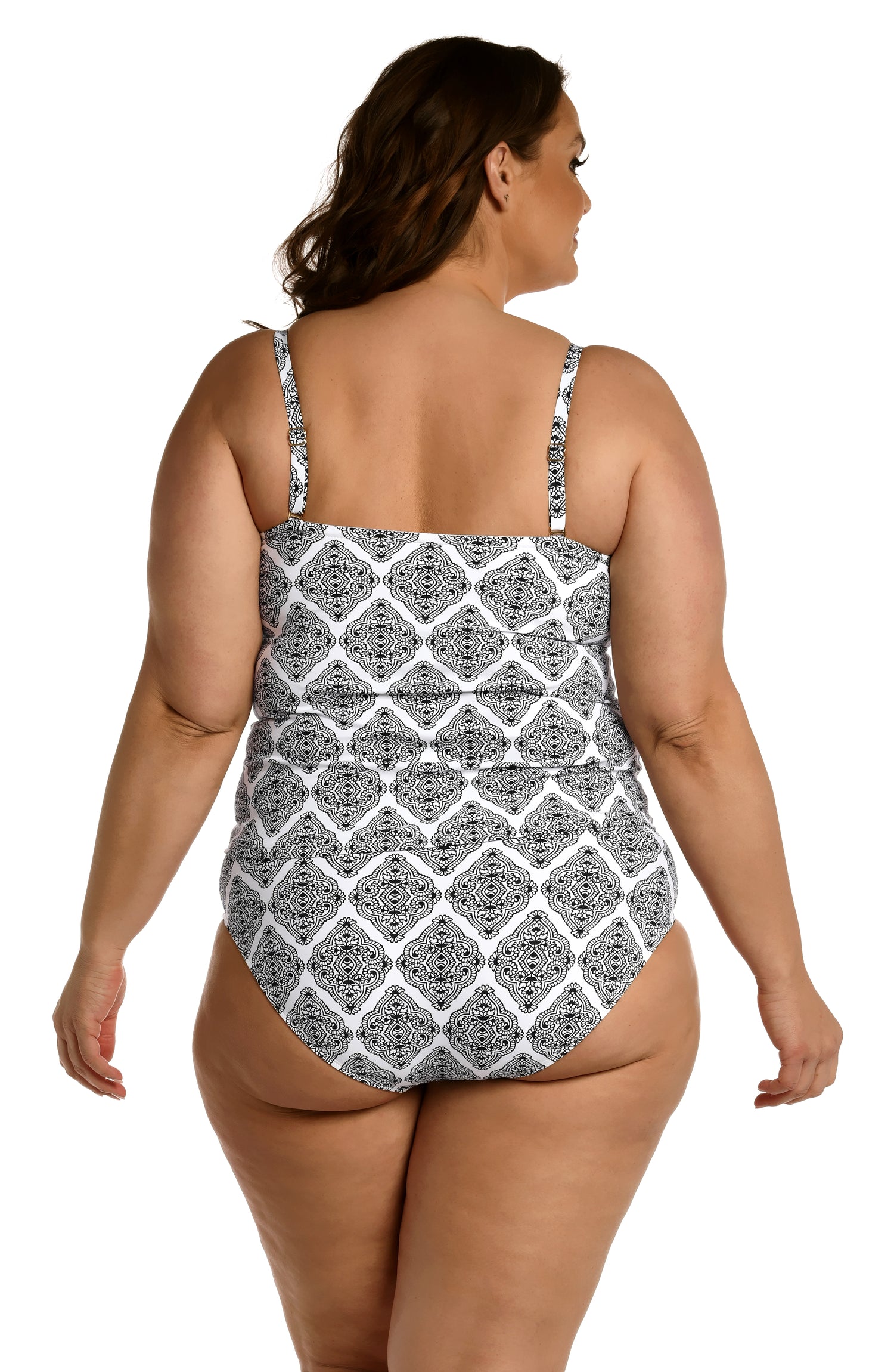 Model is wearing a black and white geometric printed bandeau tankini top from our Oasis Tile collection!