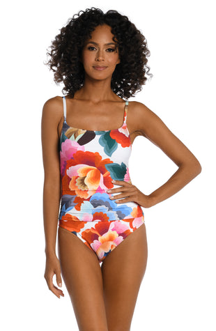 Model is wearing a multi colored floral printed lingerie one piece from our Floral Rhythm collection!