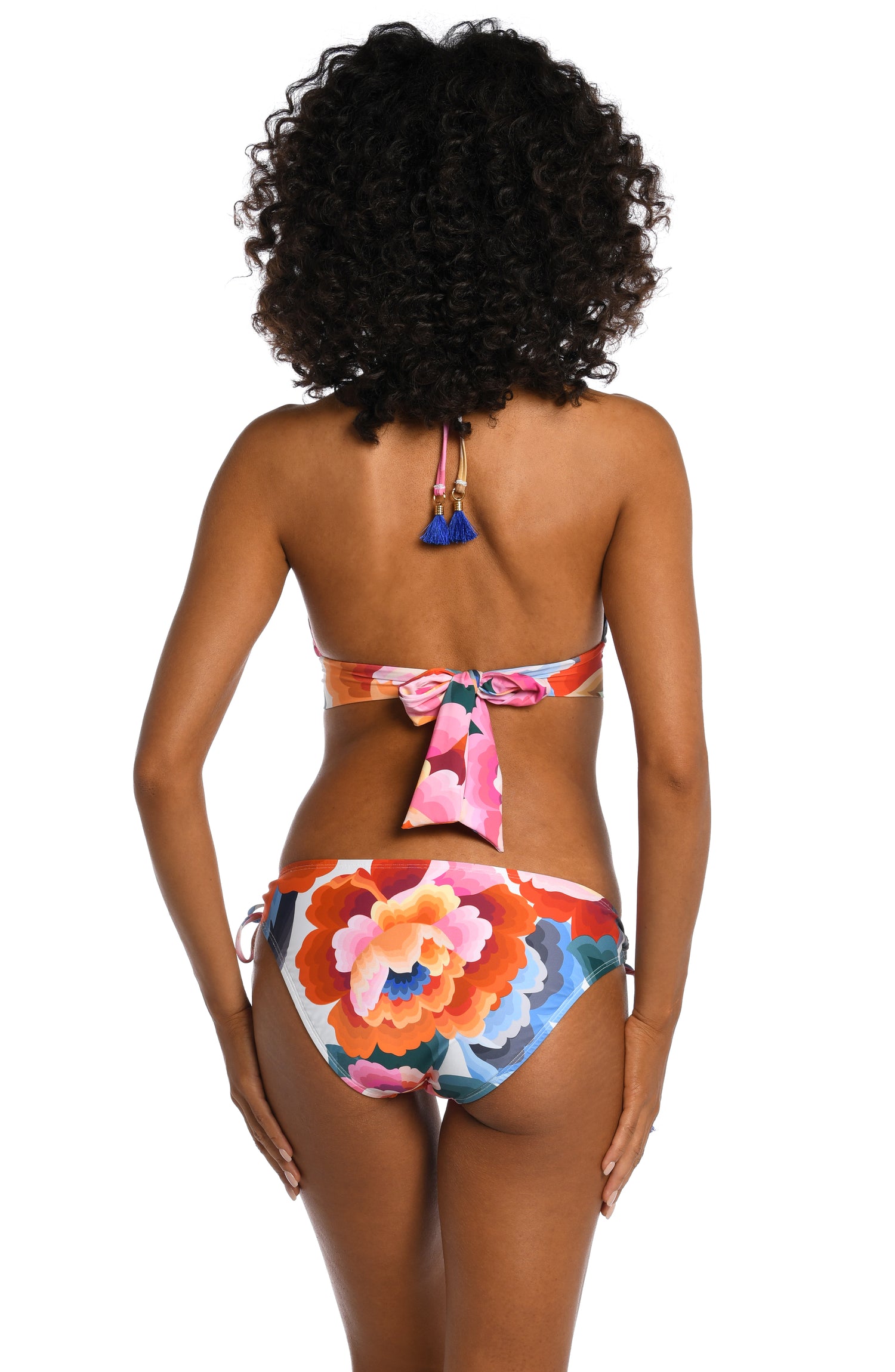 Model is wearing a multi colored floral printed banded halter triangle top from our Floral Rhythm collection!