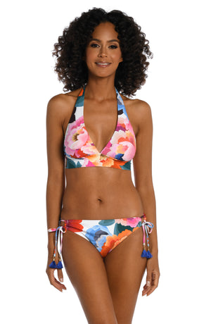 Model is wearing a multi colored floral printed banded halter triangle top from our Floral Rhythm collection!