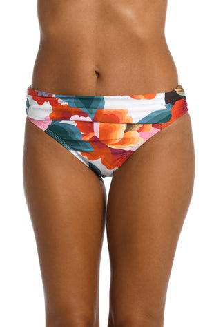 Model is wearing a multi colored floral printed shirred hipster bottom from our Floral Rhythm collection!