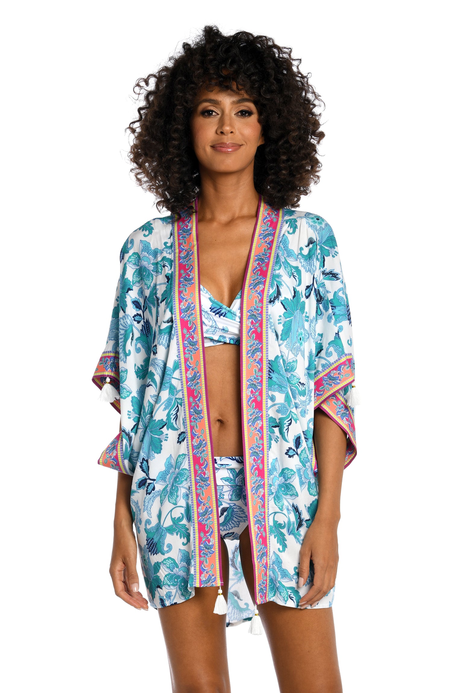 Model is wearing a light blue multi colored mediterranean printed kimono cover up from our Santorini Sun collection!