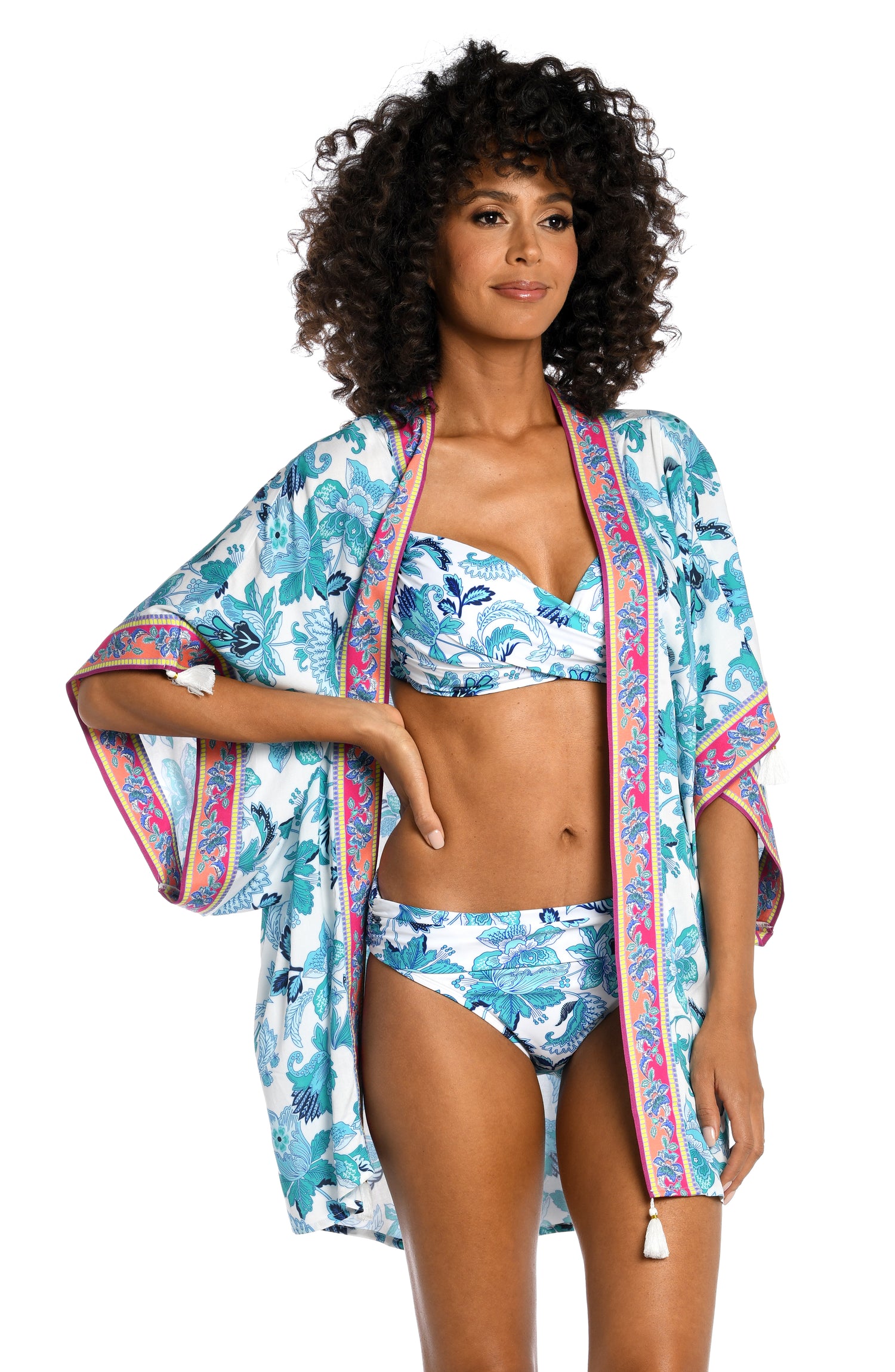 Model is wearing a light blue multi colored mediterranean printed kimono cover up from our Santorini Sun collection!