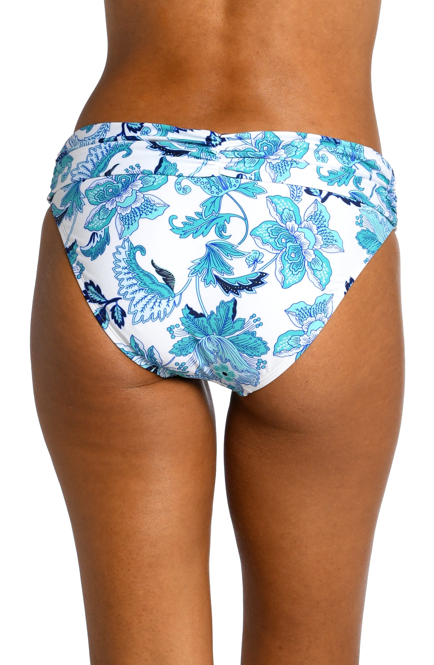 Model is wearing a light blue multi colored mediterranean printed shirred band hipster bottom from our Santorini Sun collection!