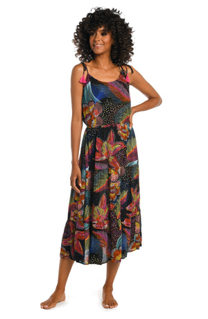 Model is wearing a shiny multicolored tropical printed maxi dress cover up from our Sunlit Soriee collection!