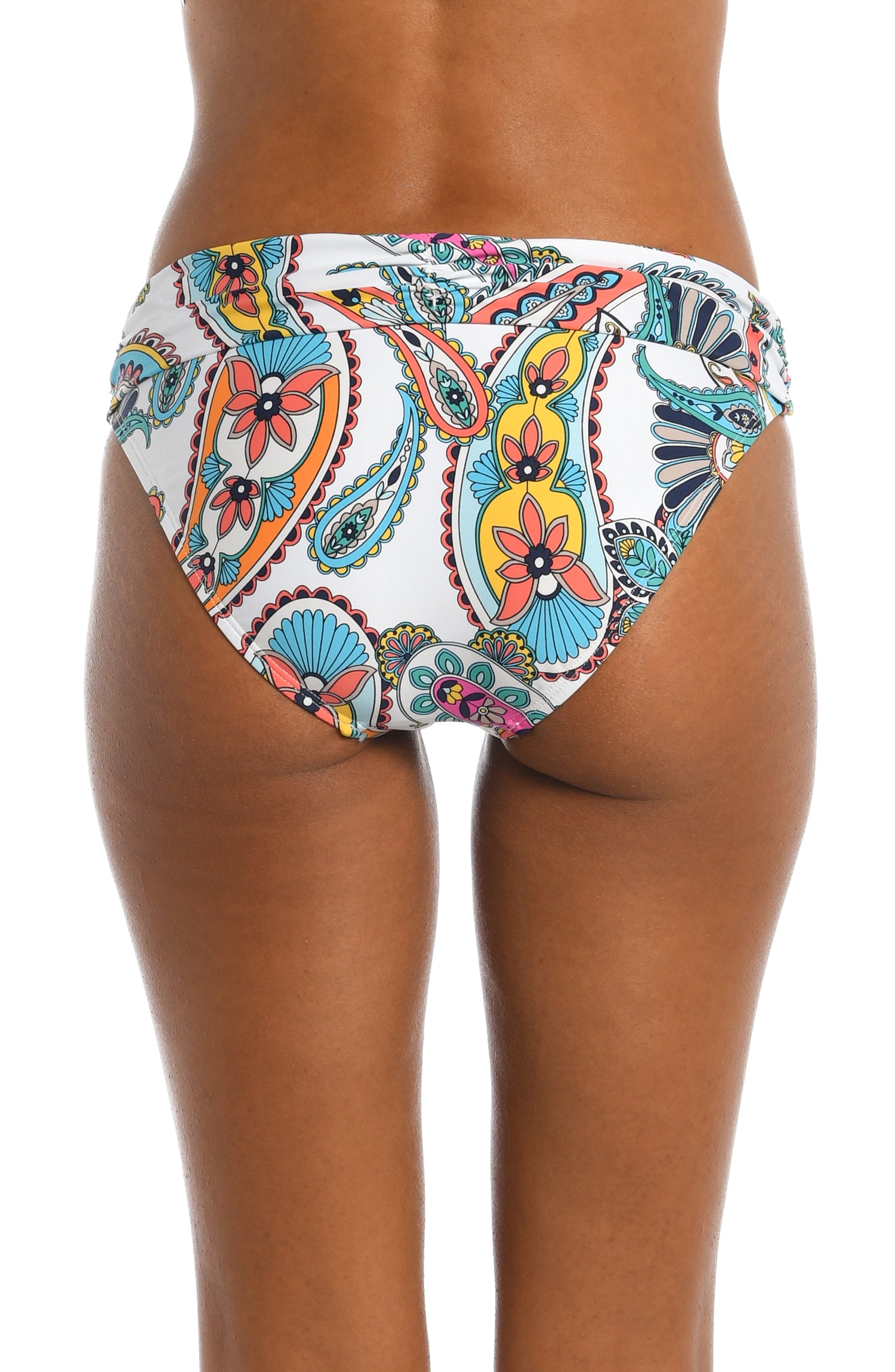 Model is wearing a multi colored paisley printed shirred hipster bottom from our Pave the Way collection!