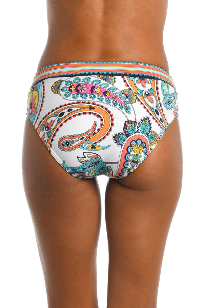 
            
                Load image into Gallery viewer, Model is wearing a multi colored paisley printed mid waist hipster bottom from our Pave the Way collection!
            
        