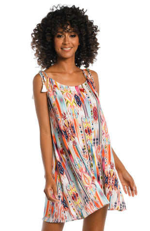 Model is wearing a multi colored tribal printed tank top dress cover up from our Desert Dream collection!