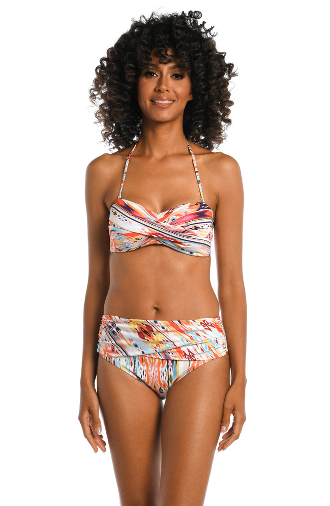 Model is wearing a multi colored tribal printed bandeau top from our Desert Dream collection!