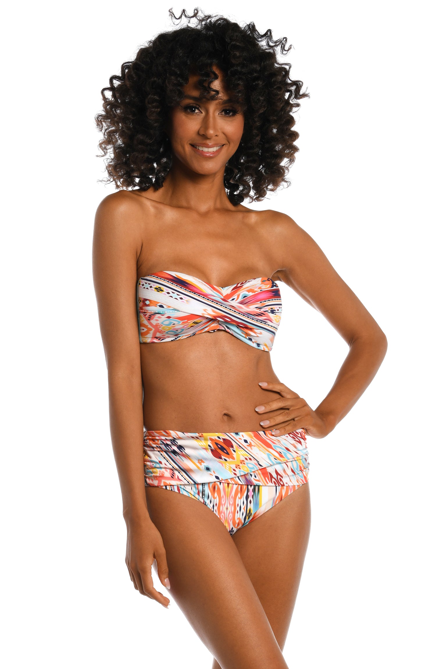 Model is wearing a multi colored tribal printed bandeau top from our Desert Dream collection!