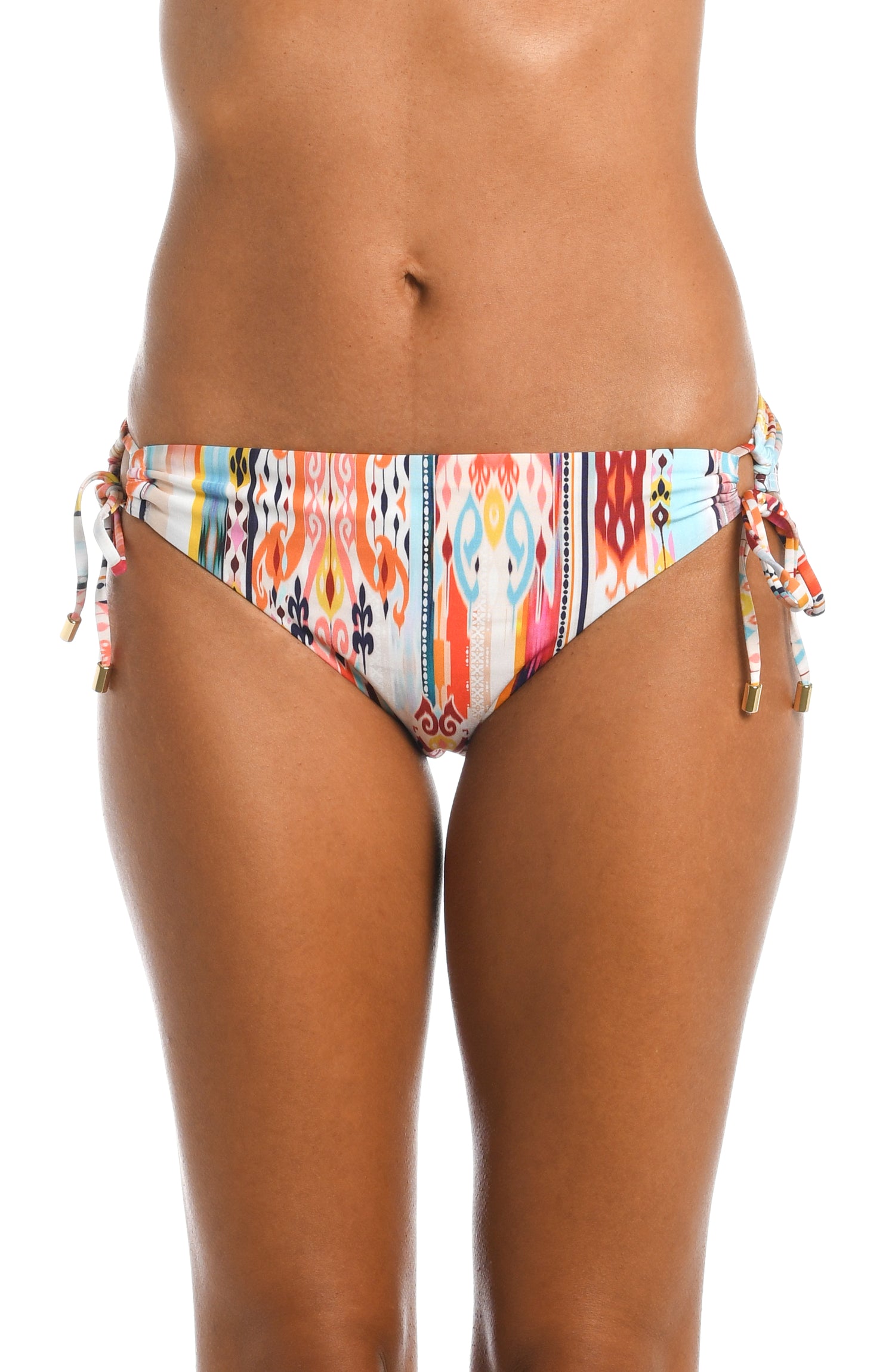 Model is wearing a multi colored tribal printed side tie hipster bottom from our Desert Dream collection!
