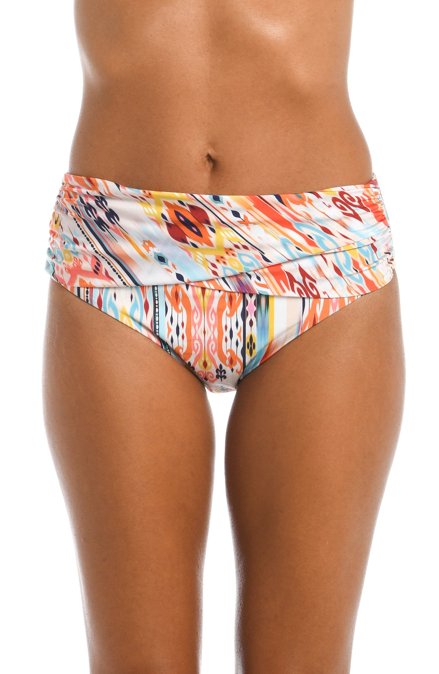 Model is wearing a multi colored tribal printed mid waist hipster bottom from our Desert Dream collection!
