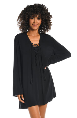 
            
                Load image into Gallery viewer, Model is wearing a solid black v-neck tunic over up from our Beachcomber Basics collection!
            
        