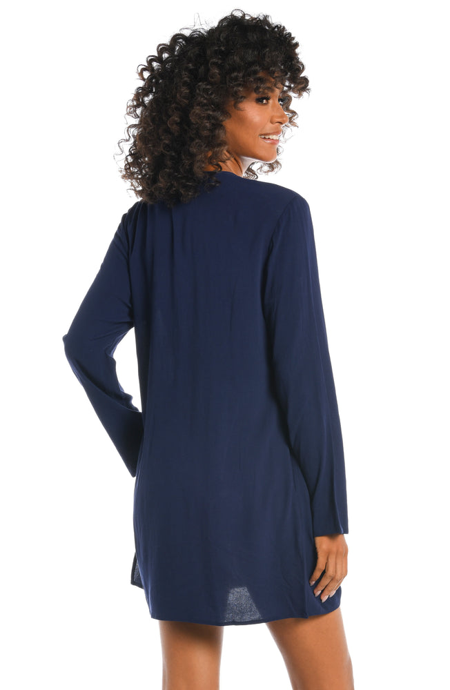 
            
                Load image into Gallery viewer, Model is wearing a solid indigo colored tunic cover up from our Beachcomber Basics collection!
            
        