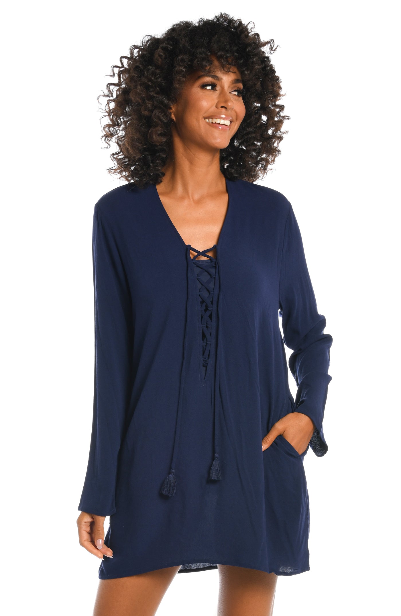 
                  
                    Model is wearing a solid indigo colored tunic cover up from our Beachcomber Basics collection!
                  
                