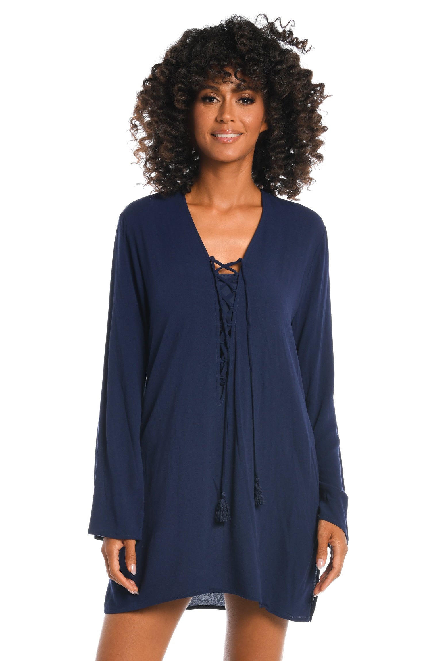 Model is wearing a solid indigo colored tunic cover up from our Beachcomber Basics collection!