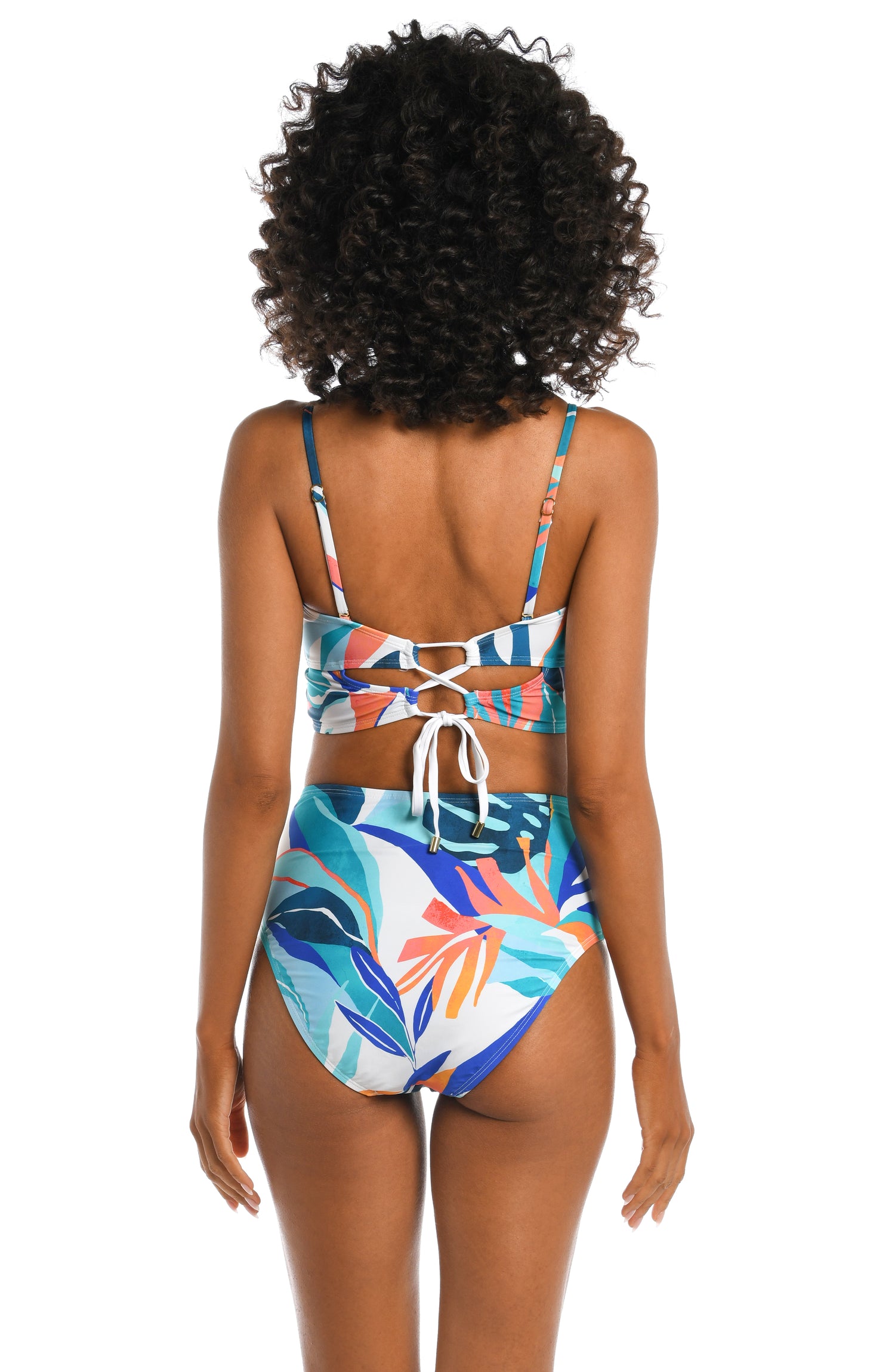 Model is wearing a blue multi colored tropical printed midkini top from our Coastal Palms collection!
