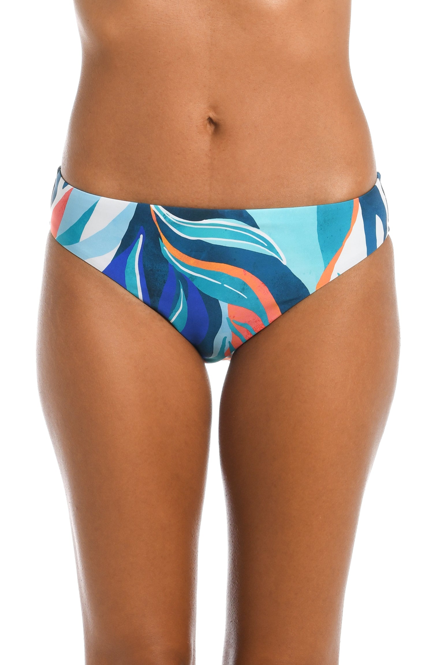 Model is wearing a blue multi colored tropical printed hipster bottom from our Coastal Palms collection!