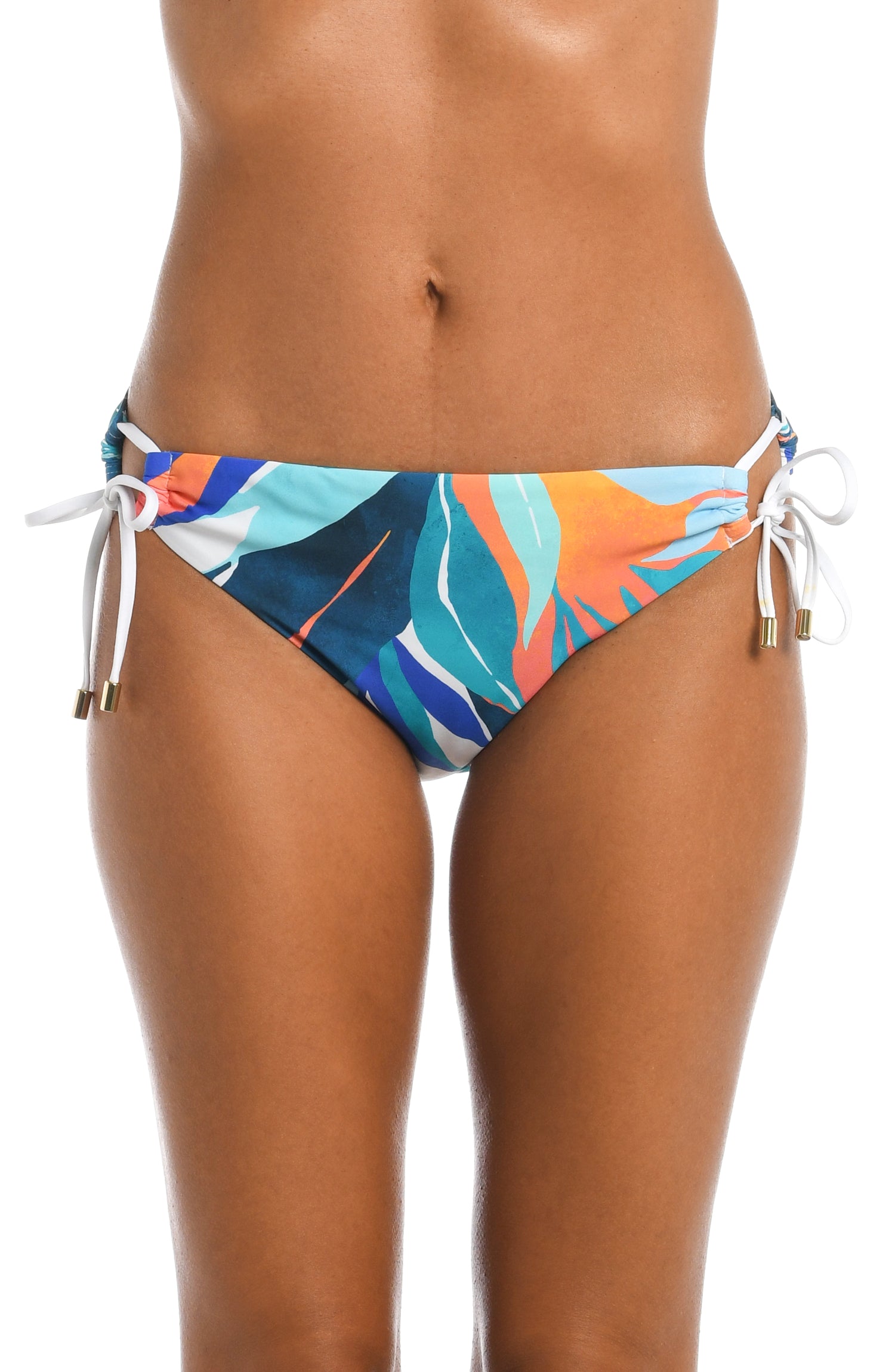Model is wearing a blue multi colored tropical printed side tie hipster bottom from our Coastal Palms collection!