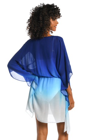 Model is wearing a sapphire colored ombre printed dress dress cover up from our Ocean Oasis collection!