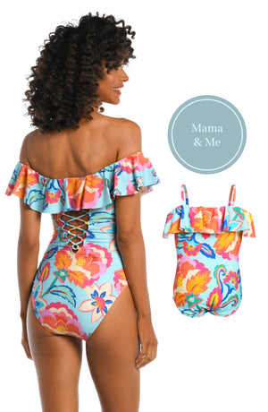 Model is wearing a light blue multi colored tropical printed off shoulder one piece from our Breezy Beauty collection!