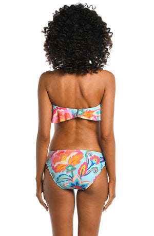 Model is wearing a light blue multi colored tropical printed bandeau top from our Breezy Beauty collection!