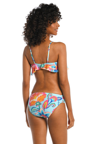 Model is wearing a light blue multi colored tropical printed bandeau top from our Breezy Beauty collection!