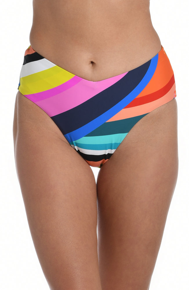 Model is wearing multi colored vibrant geometric printed v-front high waist bottom from our Sunscape collection!