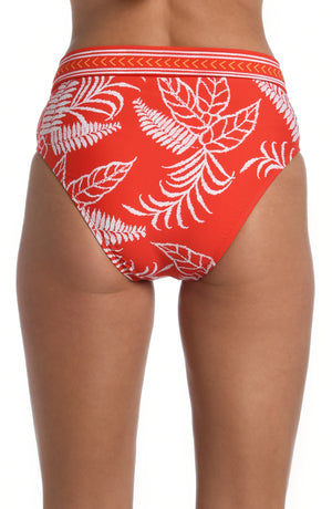 
            
                Load image into Gallery viewer, Model is wearing cherry red tropical printed crossover high waist bottom from our Tropical Tapestry collection!
            
        