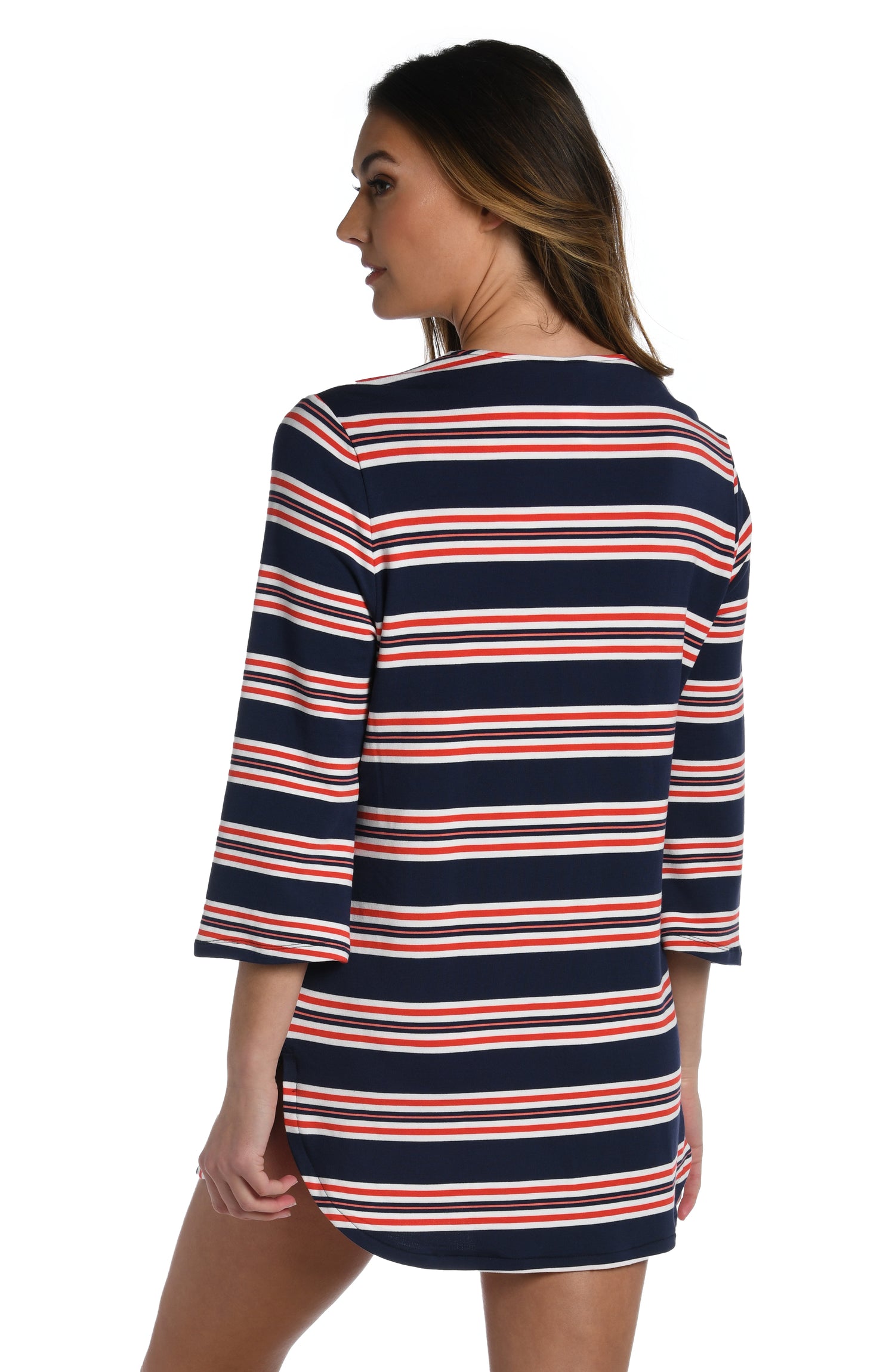 Model is wearing a red, white, and blue striped patterned v-neck tunic from our Sailor Stripe collection!