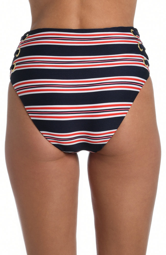 Model is wearing a red, white, and blue striped patterned high waist bottom from our Sailor Stripe collection!