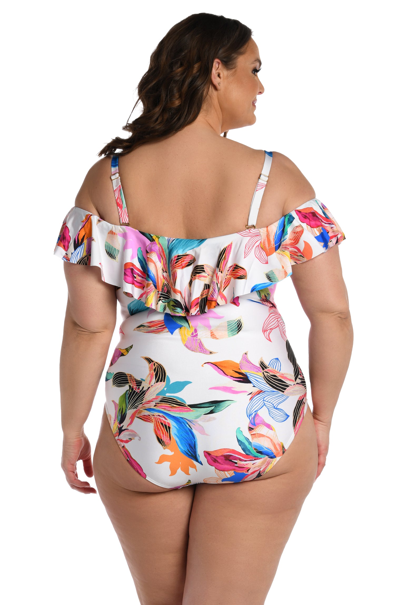 Model is wearing a multi colored tropical printed off shoulder one piece from our Paradise City collection!