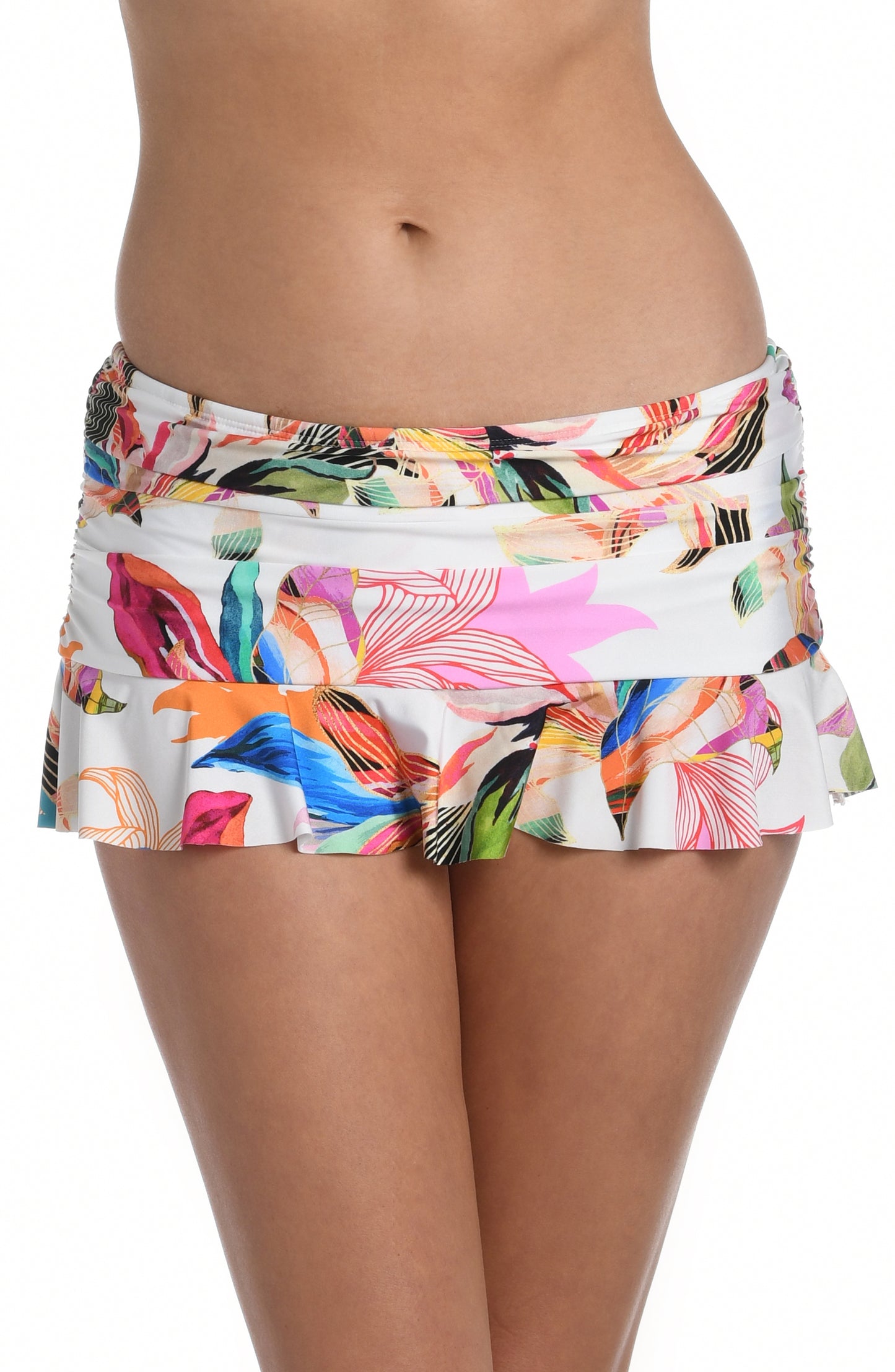 Model is wearing a multi colored tropical printed ruffle skirted bottom from our Paradise City collection!