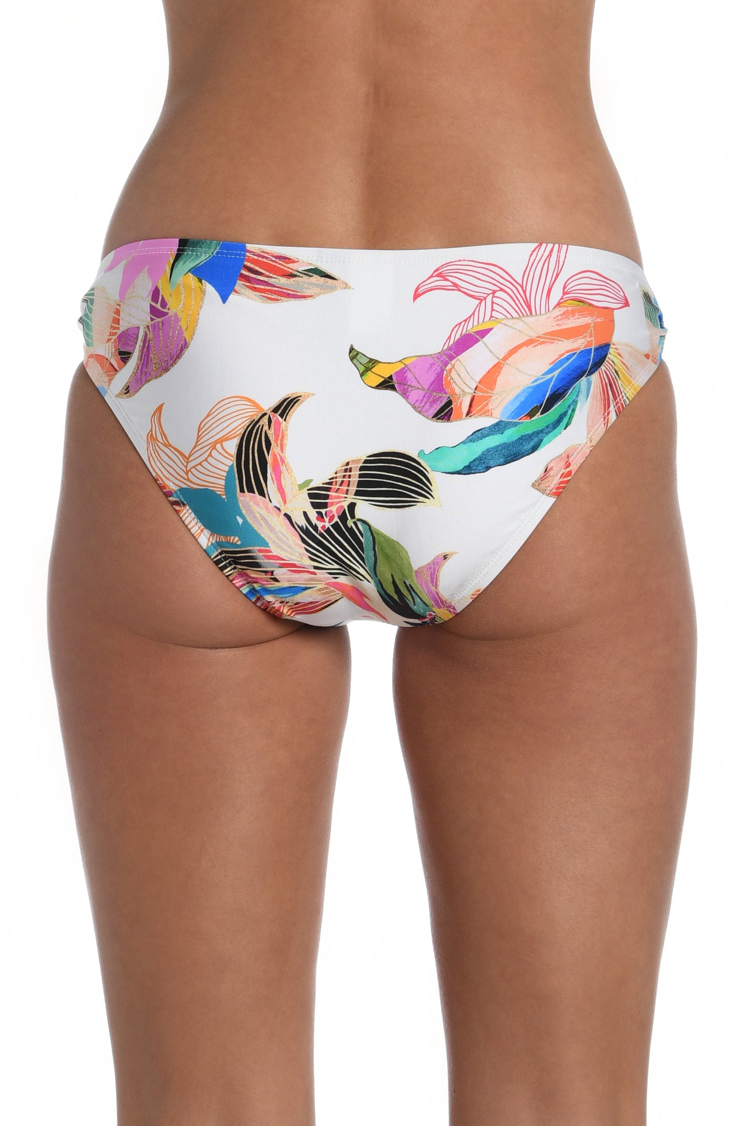 Model is wearing a multi colored tropical printed side tie hipster bottom from our Paradise City collection!