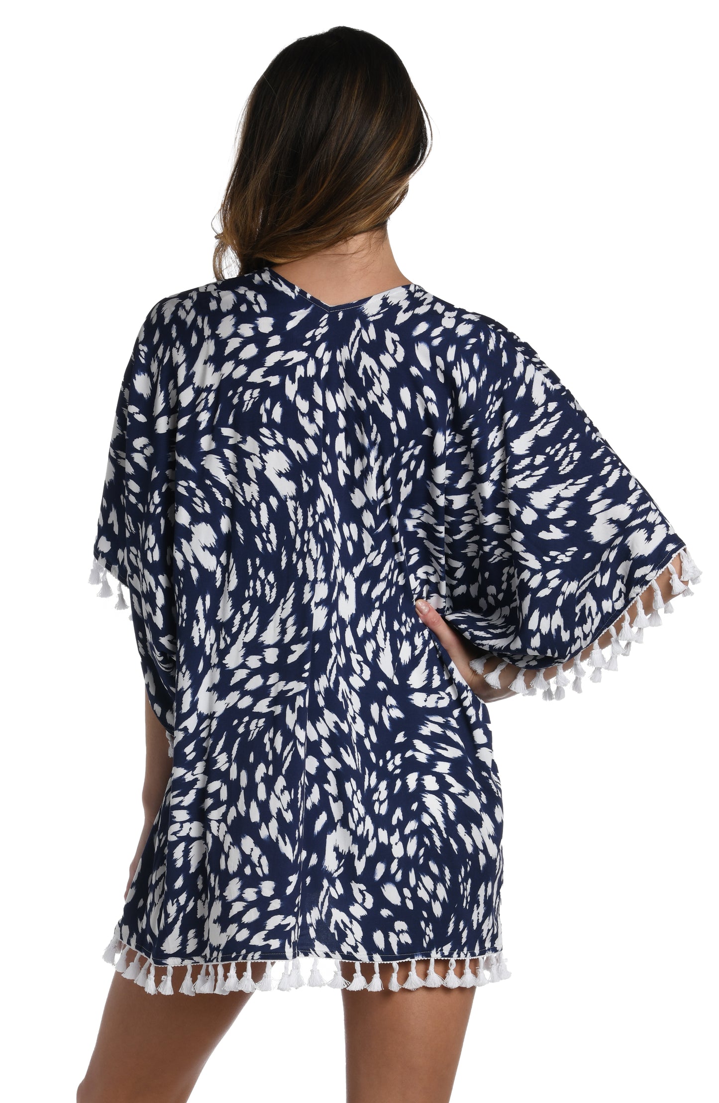 Model is wearing a indigo blue colored print with pops of white on this kimono cover up from our Changing Tides collection!