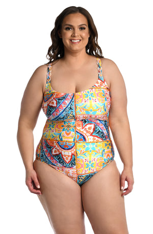 Model is wearing a moroccan inspired multi colored printed lingerie one piece from our Soleil collection!