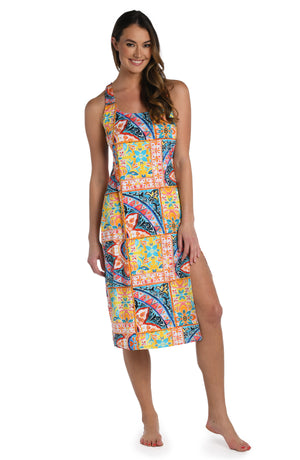 
            
                Load image into Gallery viewer, Model is wearing a moroccan inspired multi colored printed over the shoulder dress cover up from our Soleil collection!
            
        