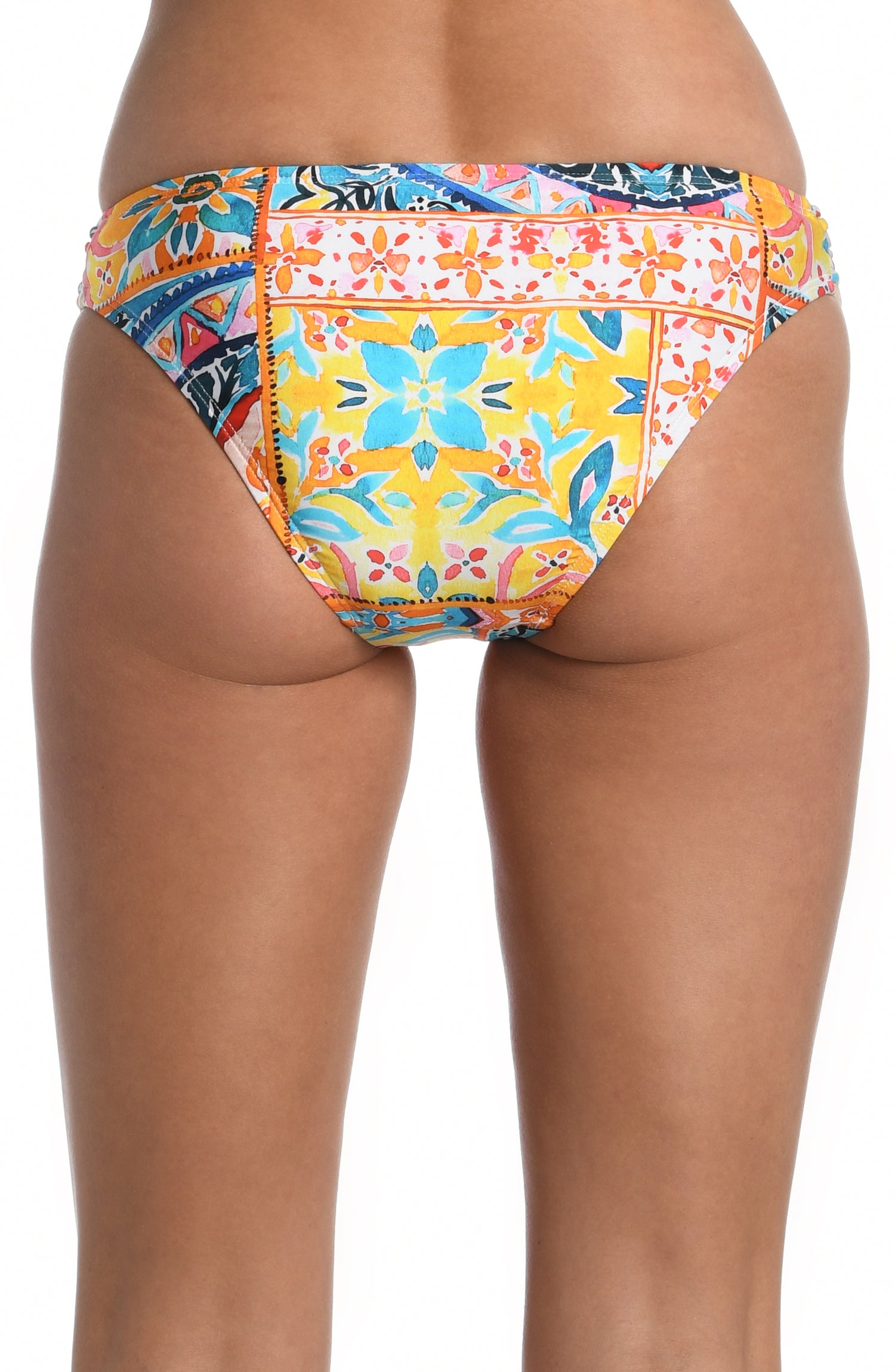 Model is wearing a moroccan inspired multi colored printed shirred hipster bottom from our Soleil collection!